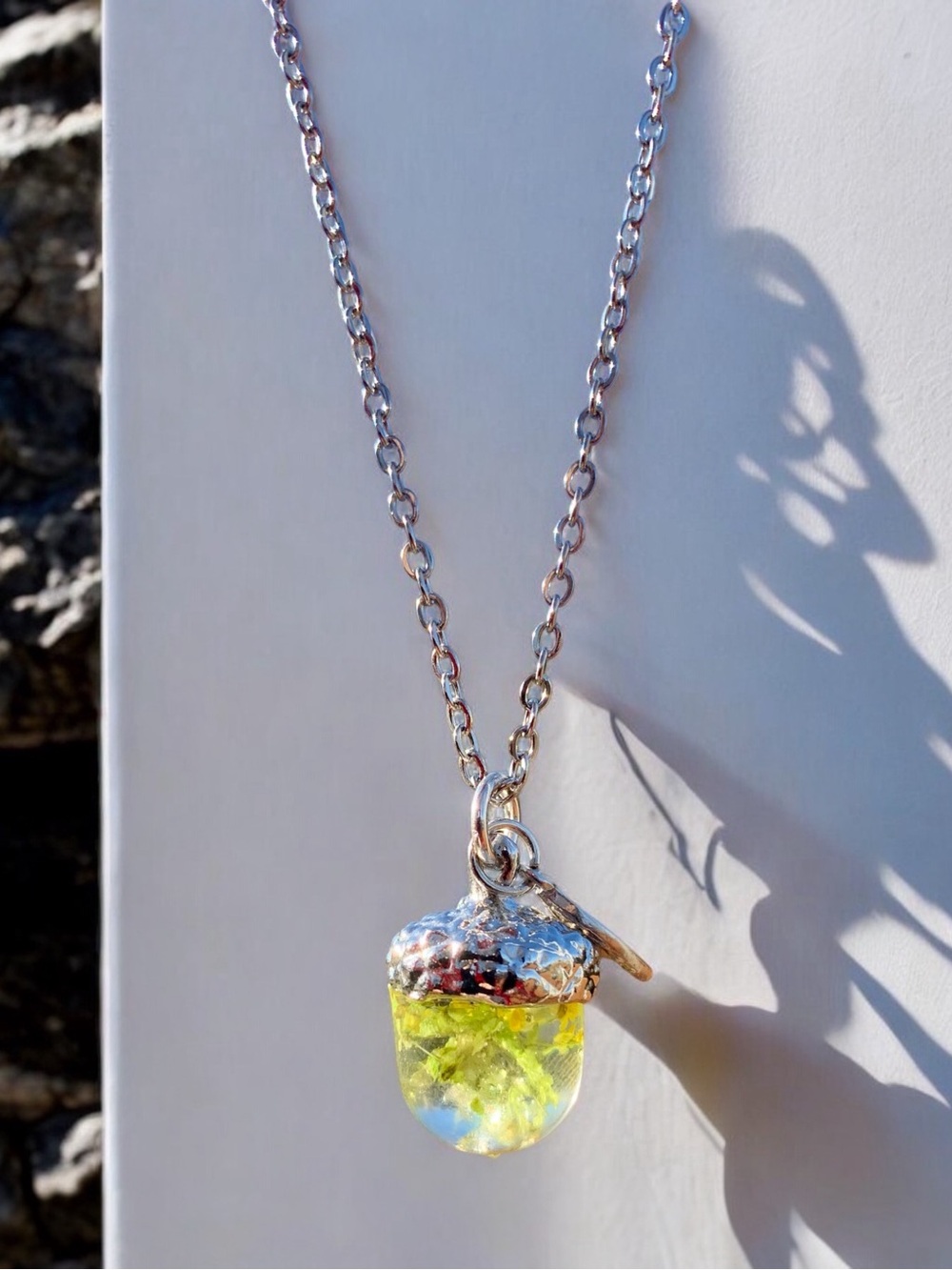 Handmade Resin acorn pendant necklace with real flowers on a simple silver chain